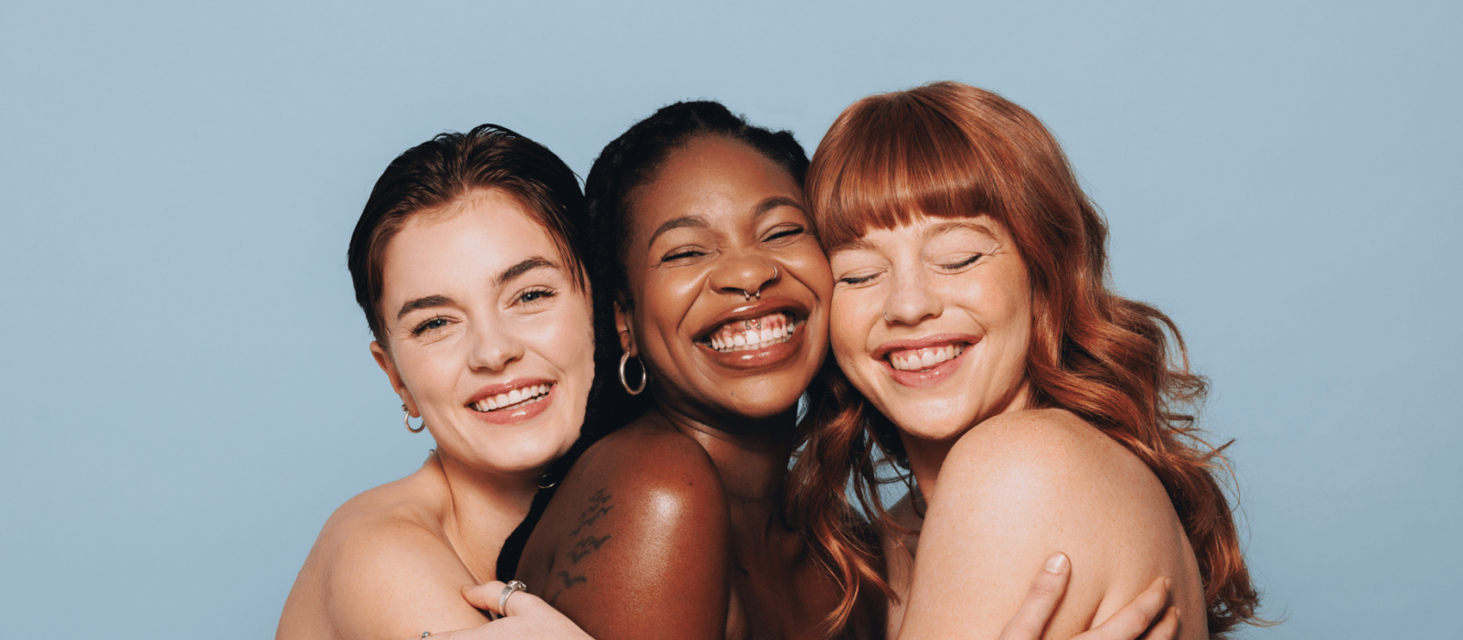 three woman smiling